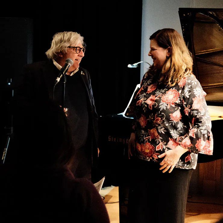 David Jaeger and Elizabeth Reid speaking on stage